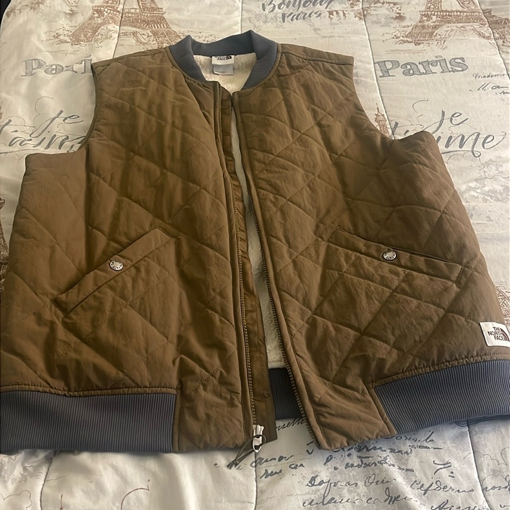 The North Face warm vest great for working outdoors